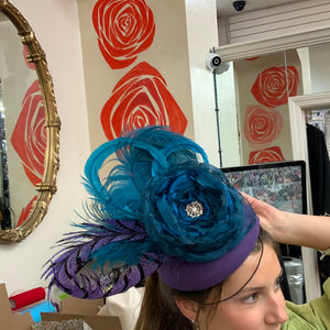 Purple and turquoise feather fascinator